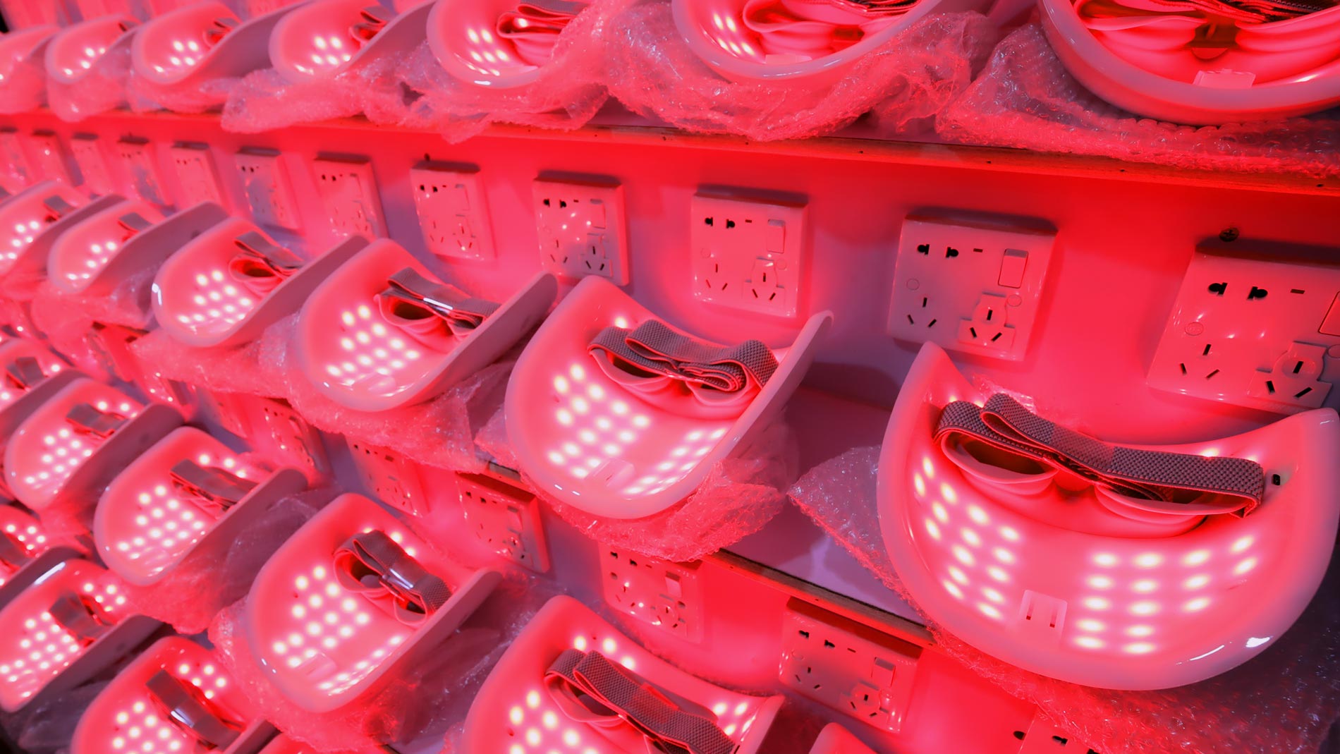 3D flexible silicone red light therapy mask worn on face showing full contour coverage